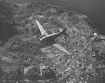 Ph00021275 - C-47 Douglas Skytrain drops supplies to the 503rd Parachute Infantry on Topside, Correg