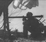 Ph00021276 - 503rd Paratrooper fires a “bazooka” during the battle to retake the “Rock,” Corregidor,