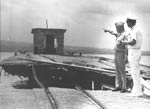 Ph00015084 - Rear Admiral Bulkeley on the north dock where his PT boat retrieved the MacArthur’s on 